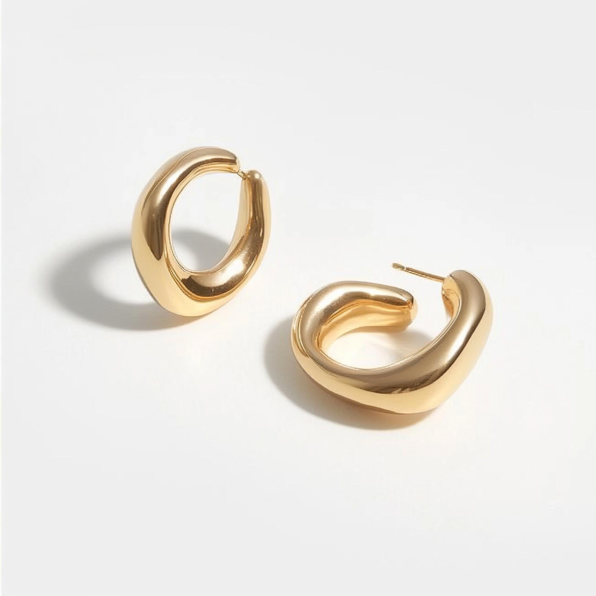 Sleek Twist Gold Hoop Earrings